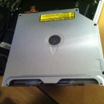 super_drive_removed The SuperDrive, no longer useful for me